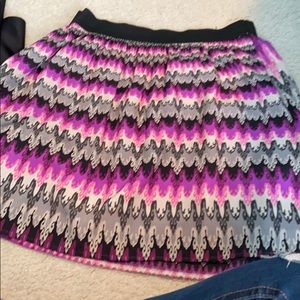 Formal skirt that falls mid thigh.